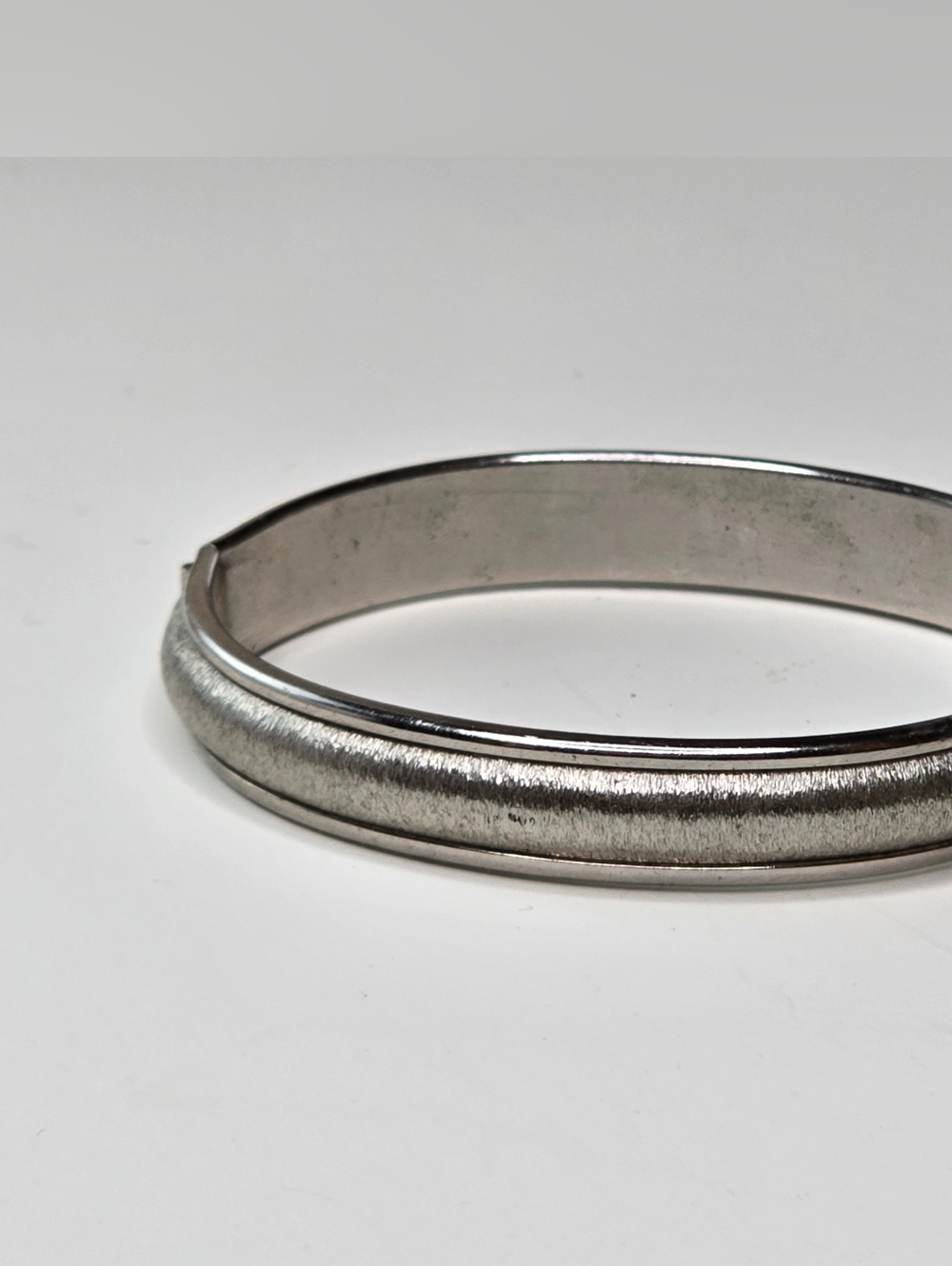 Napier Silver Tone Elegant Hinged Cuff With Safety Chain Link Clasp